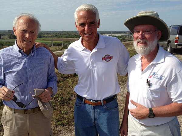 2013a Charles Crist, former governor of Florida, visiting a geomembrane site with J.P. Giroud and Ian Peggs